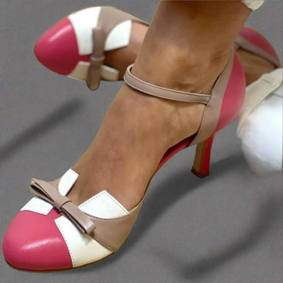 LUCINDA | Elegant color block low-heeled shoe with a pretty bow ornament