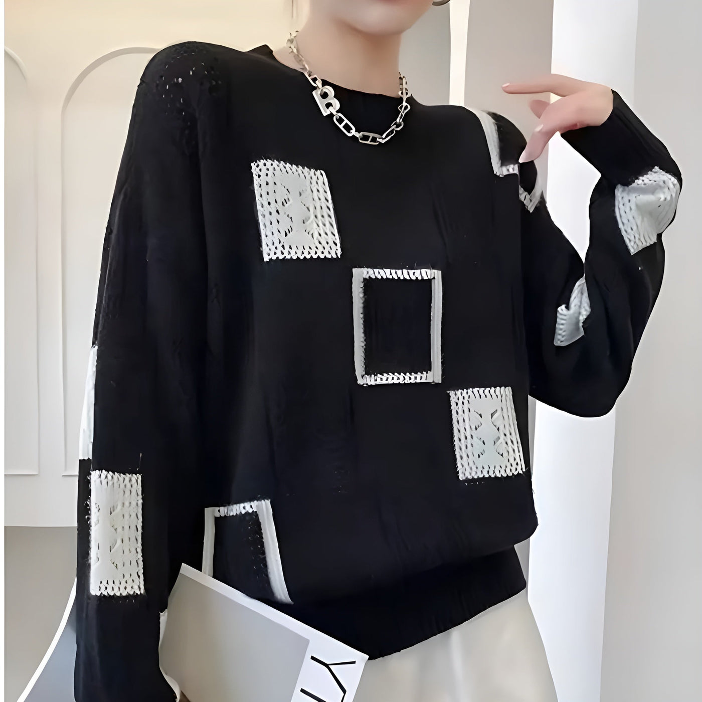 Anastasia – Elegant Knit with Geometric Detailing
